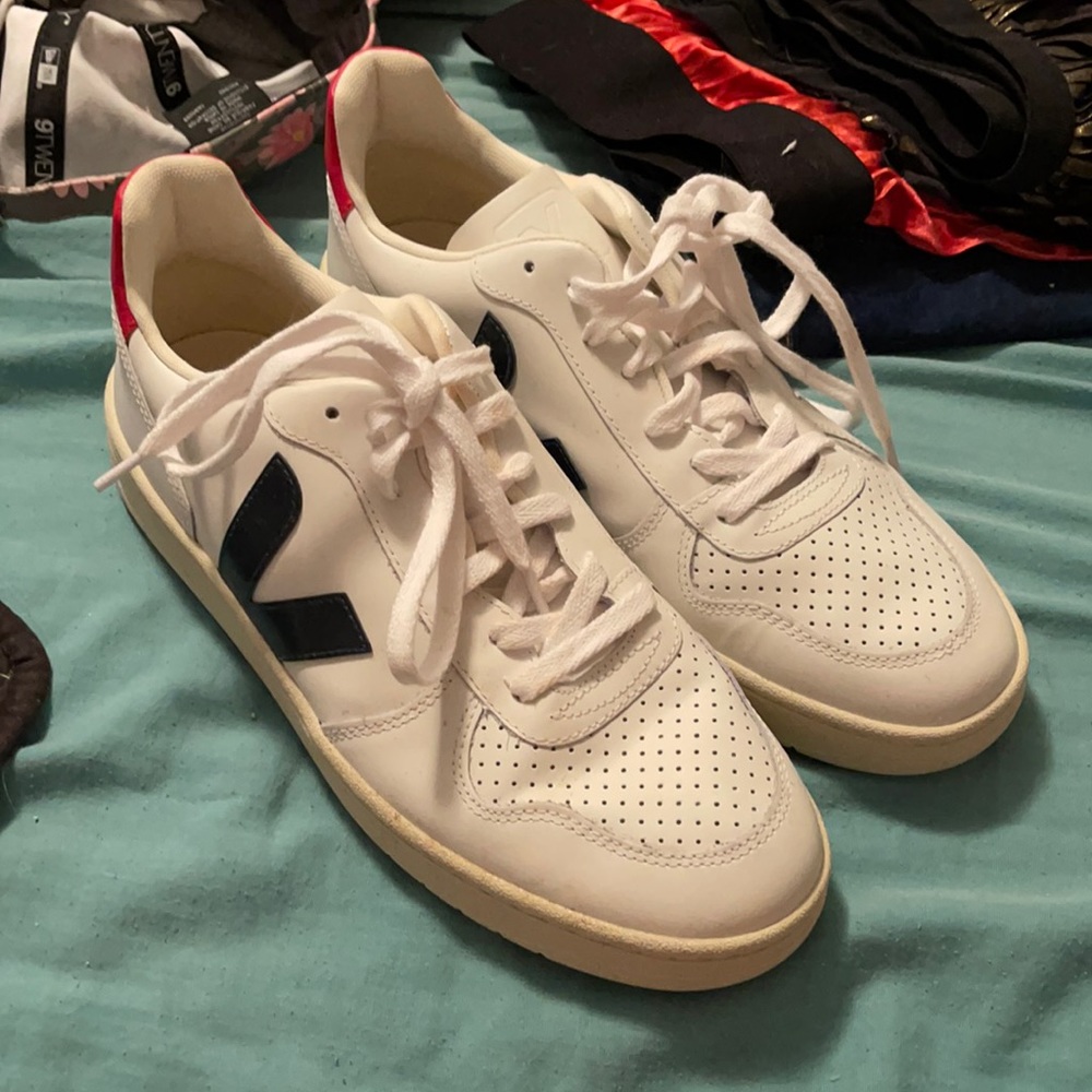 Veja red and blue sneakers.